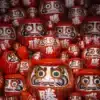a large group of red and white masks