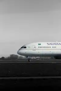 a large passenger jet sitting on top of an airport runway